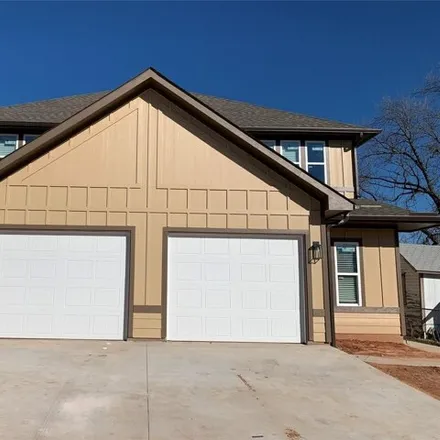 Rent this 3 bed house on 487 Maple Row in Denison, TX 75021