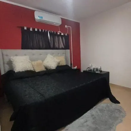 Buy this 3 bed house on Presidente Arturo Umberto Illia 3375 in Rafael Calzada, Argentina