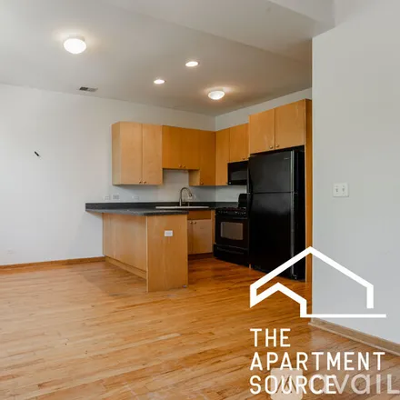 Rent this 3 bed apartment on 1446 N Leavitt St