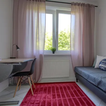 Rent this 4 bed room on FizjoSpace in Puławska 29, 00-792 Warsaw