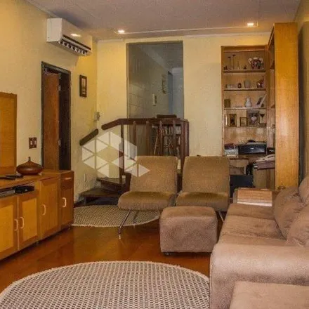 Buy this 3 bed house on Rua Roque Calage in Passo da Areia, Porto Alegre - RS