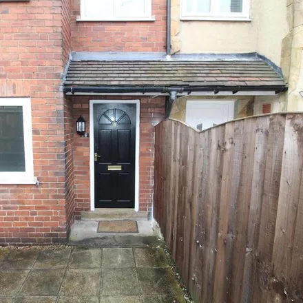 Rent this 3 bed townhouse on Thornton Avenue in Leeds, LS12 3JD
