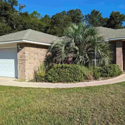 Buy this 4 bed house on 5939 Ashton Woods Circle in Milton, FL 32570