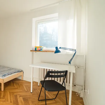 Rent this 4 bed room on Czerniakowska 159 in 00-453 Warsaw, Poland
