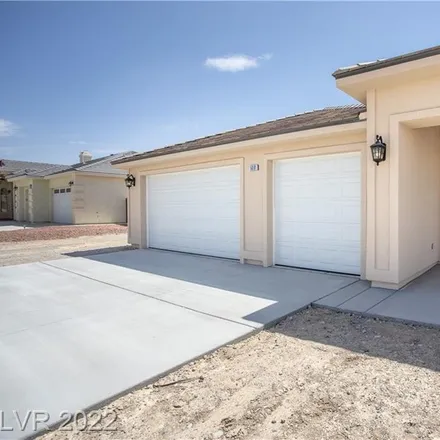 Buy this 3 bed house on 6677 Raintree Court in Pahrump, NV 89061