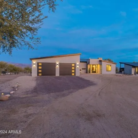 Buy this 4 bed house on East Caverdale Drive in Maricopa County, AZ 85263