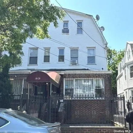 Buy this 5 bed house on 40-20 80th Street in New York, NY 11373