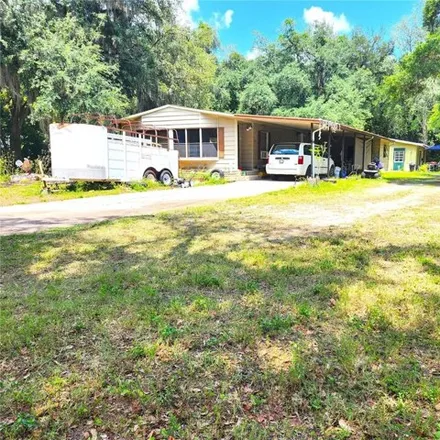 Buy this studio apartment on 4294 Burrows Road in Pasco County, FL 33542
