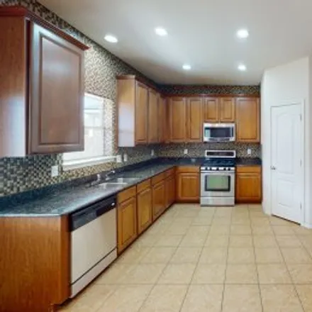 Buy this 5 bed apartment on 506 Stream Mill Lane in Grand Harbor, Katy
