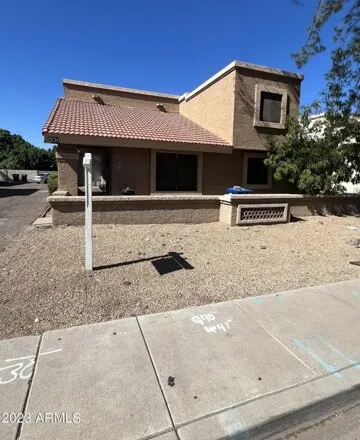 Rent this 2 bed apartment on 930 N Revere Unit 201 in Mesa, Arizona