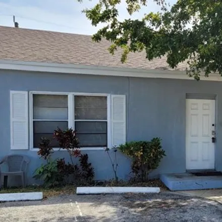 Rent this 3 bed house on 191 East 27th Street in Riviera Beach, FL 33404