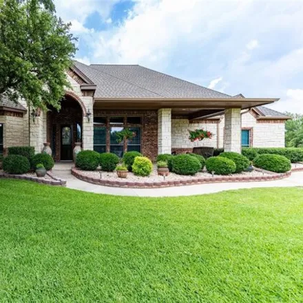 Buy this 4 bed house on 5210 Arbor Mill Drive in Tarrant County, TX 76135