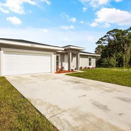 Image 3 - 1188 Ver Circle Northeast, Palm Bay, FL 32905, USA - House for sale