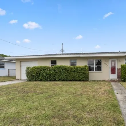 Buy this 4 bed house on 1970 Barkley Avenue in Melbourne, FL 32935