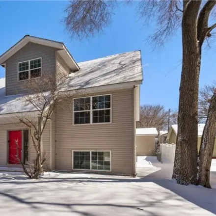 Buy this 5 bed house on 6253 6th Street North in Oakdale, MN 55128