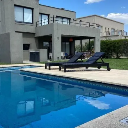 Rent this 3 bed house on unnamed road in Partido de Tigre, Dique Luján