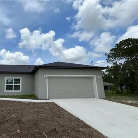 Rent this 3 bed house on 361 Fifer St SE in Palm Bay, Florida