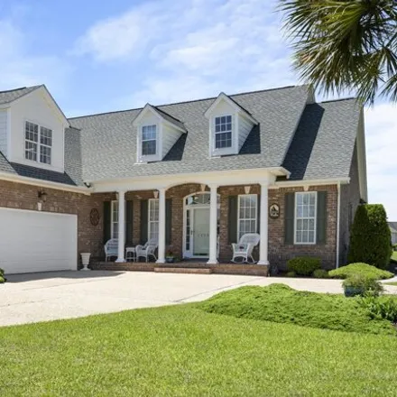 Buy this 4 bed house on 1099 Golden Sands Way in Leland, NC 28451