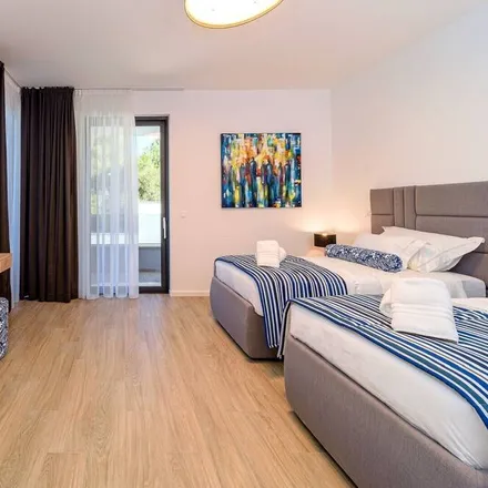 Rent this 4 bed house on 21222 Općina Marina
