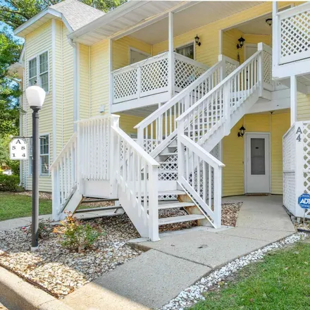 Buy this 2 bed townhouse on Trade Winds Shopping Center in 601 East Burgess Road, Pensacola
