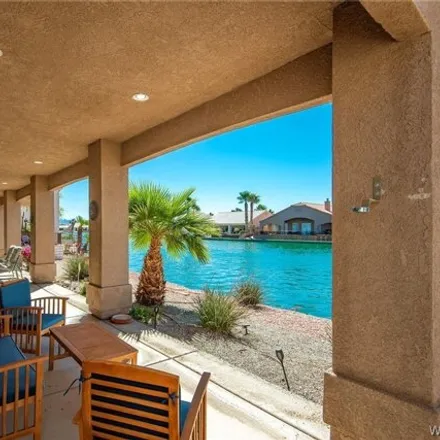 Buy this 4 bed house on 2054 Lago Grande Place in Mohave Valley, AZ 86426