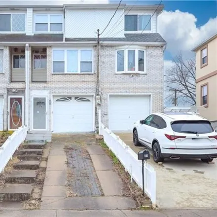Buy this 3 bed townhouse on 24 Mapleton Avenue in New York, NY 10306