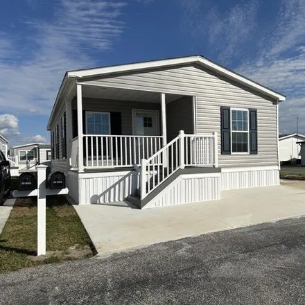 Buy this studio apartment on 1101 W Commerce Ave # Mh043 in Haines City, Florida
