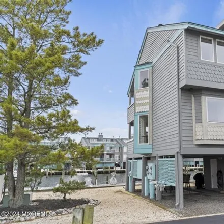 Rent this 2 bed townhouse on 37 Grand Bay Harbour Drive in Barnegat Beach, Ocean Township