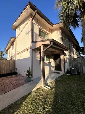 Rent this 3 bed house on 577 Park Avenue in Satellite Beach, FL 32937