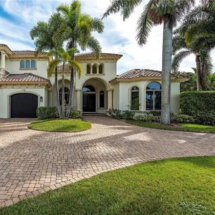 Rent this 4 bed house on 1586 Ixora Drive in Naples, FL 34102