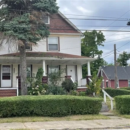 Buy this 11 bed house on 7056 Roy Avenue in Cleveland, OH 44104