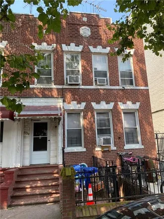 Buy this 7 bed townhouse on 1761 66th Street in New York, NY 11204