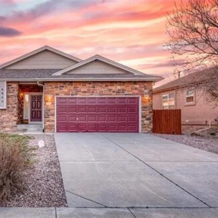 Buy this 4 bed house on Antler Creek Golf Course in 9650 Antler Creek Drive, El Paso County