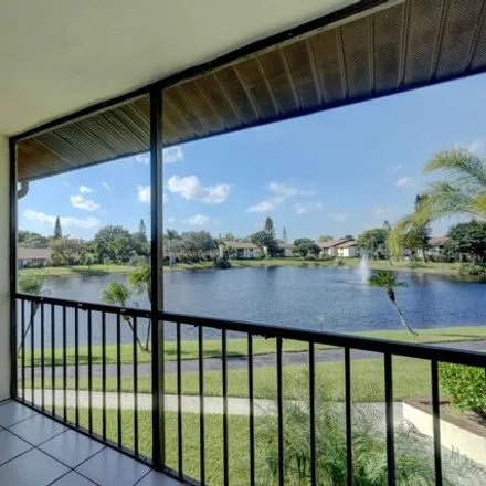 Buy this 2 bed condo on 4800 Sable Pine Circle in Cypress Lakes, Palm Beach County