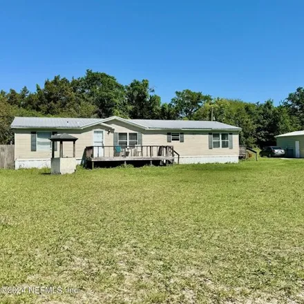 Buy this 3 bed house on 4991 Cedar Point Road in Jacksonville, FL 32226