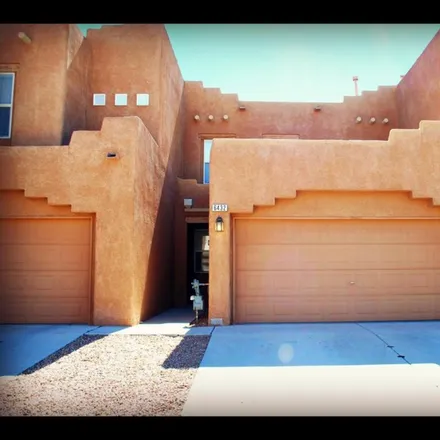 Rent this 2 bed townhouse on 6432 Los Pueblos PL NW