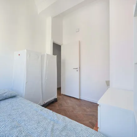 Rent this 16 bed room on Pastelaria Parque in Rua Sampaio e Pina, 1070-051 Lisbon