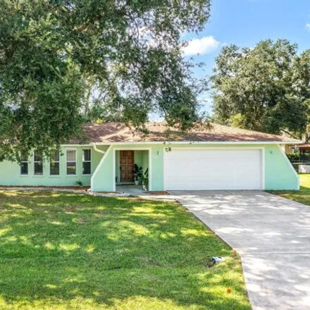Buy this 4 bed house on 954 Piedmont Avenue Northeast in Palm Bay, FL 32907
