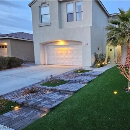 Rent this 4 bed house on 2974 Hot Cider Avenue in North Las Vegas, NV 89031