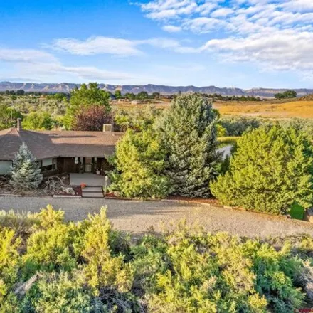 Buy this 4 bed house on 2108 Desert Hill Road in Grand Junction, CO 81507