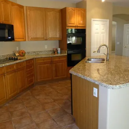 Rent this 5 bed apartment on 3035 North 144th Drive in Goodyear, AZ 85395