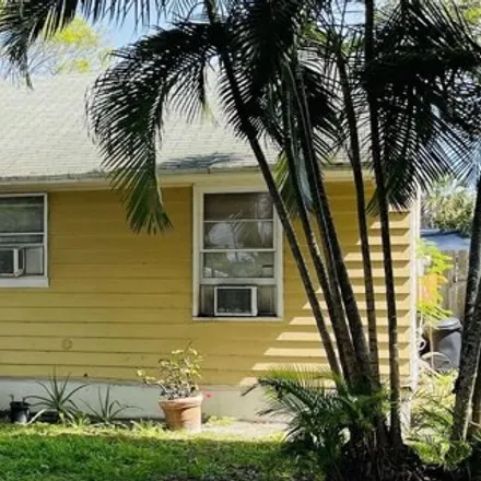 Buy this 5 bed house on 3316 Pinewood Avenue in West Palm Beach, FL 33407