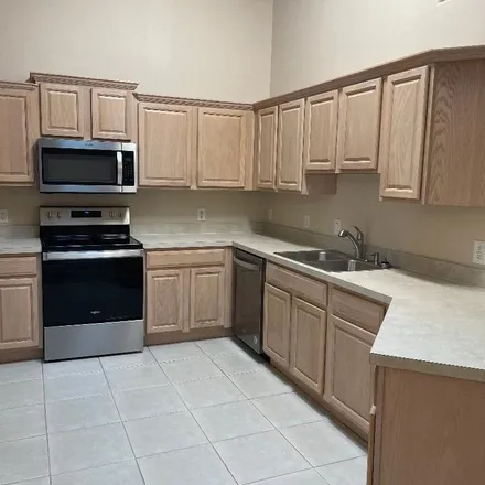 Rent this 3 bed townhouse on 267 Prince William Court in Satellite Beach, FL 32937