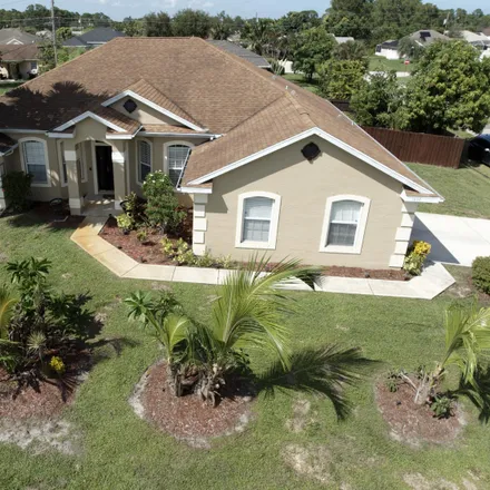 Buy this 5 bed house on 1699 Southwest Crawford Avenue in Port Saint Lucie, FL 34953