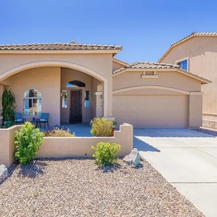 Buy this 4 bed house on 699 West Adagio Lane in Oro Valley, AZ 85737