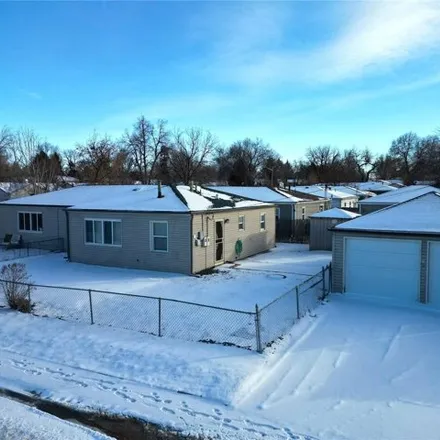 Buy this 4 bed house on 9078 East 13th Avenue in Aurora, CO 80010