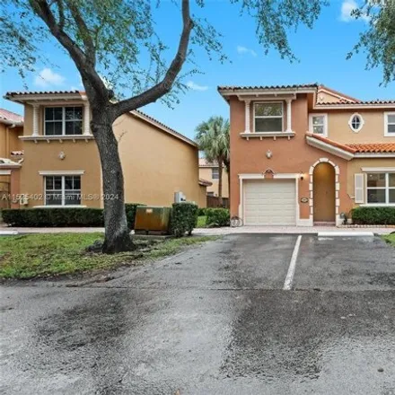 Rent this 3 bed townhouse on 8505 Northwest 140th Street in Miami Lakes, FL 33016