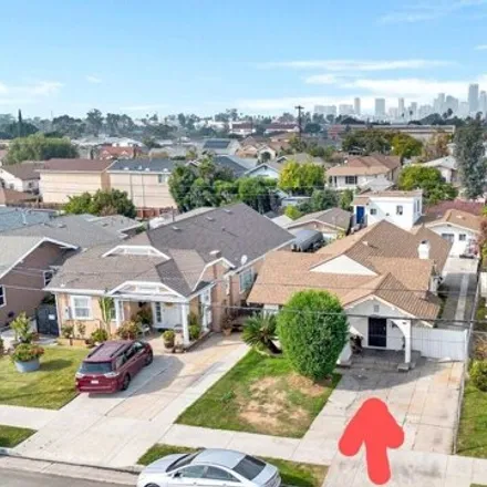 Buy this 7 bed house on 9339 Camulos Street in Los Angeles, CA 90023