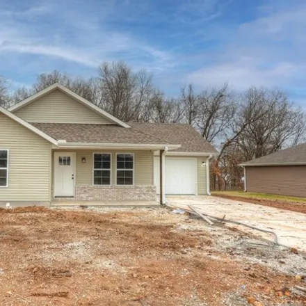 Buy this 2 bed house on 2059 Marigold Street in Carthage, MO 64836