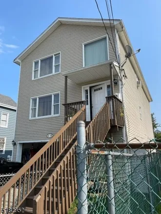 Buy this 6 bed townhouse on 82 North 11th Street in Paterson, NJ 07522